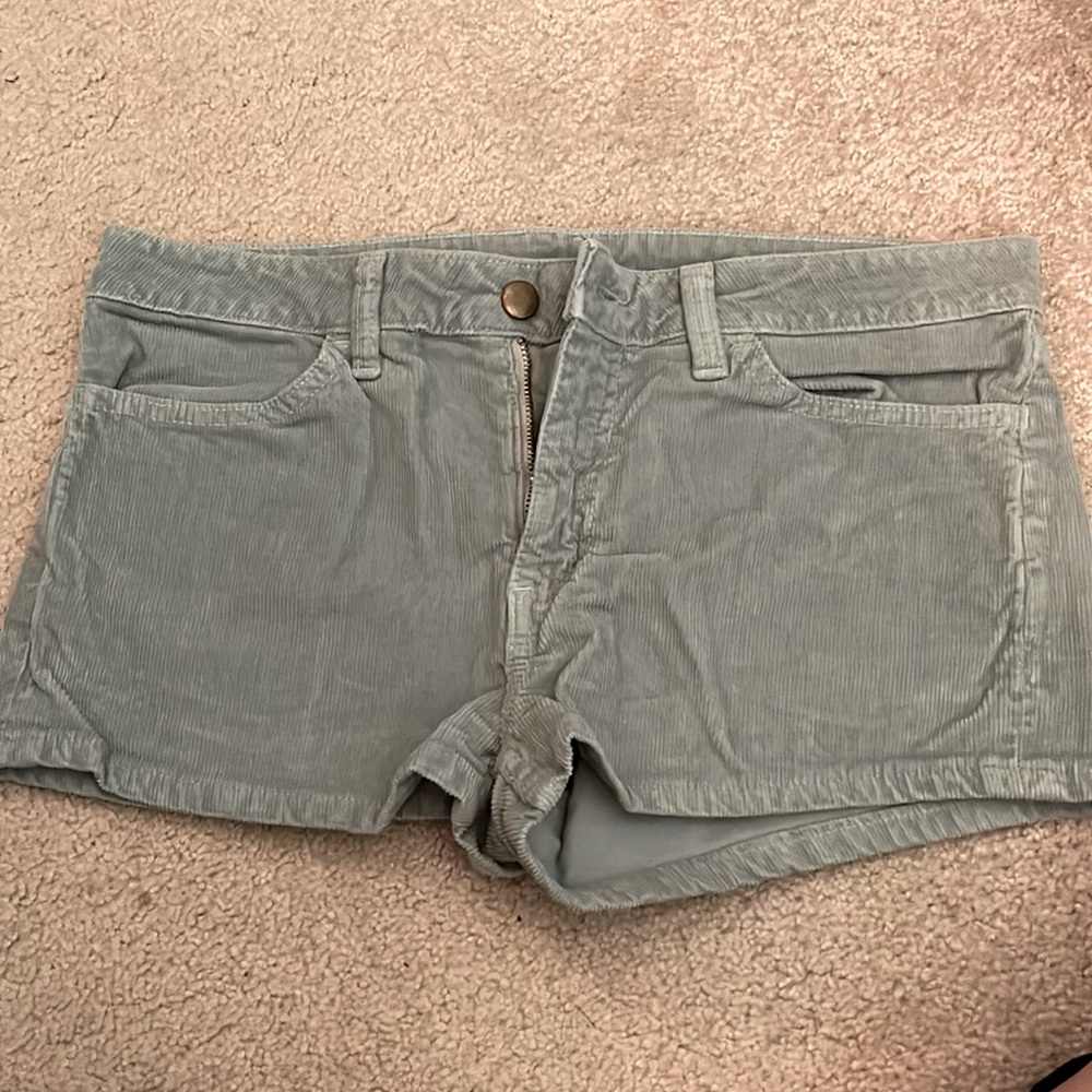 Sea foam colored corduroy material short shorts.